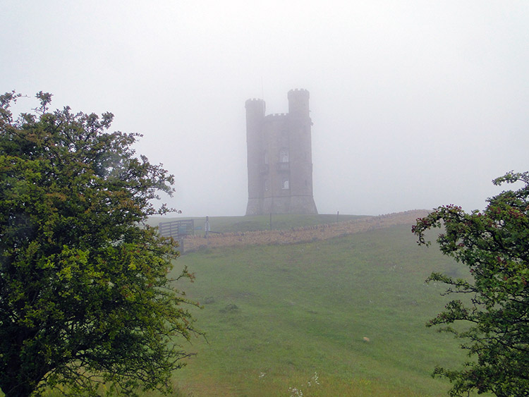 Broadway Tower appears from the gloom