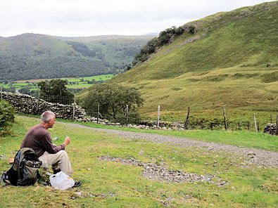 Hans looks back to the steep hill just descended