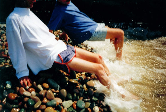 The boys do the traditional dip to complete the walk