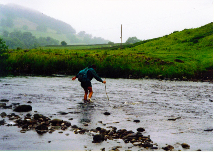 Deke wades across the River Swale