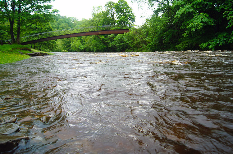 Modern footbridge over the River Irthing