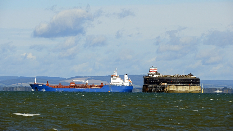 Ship passing No Man's Land Fort