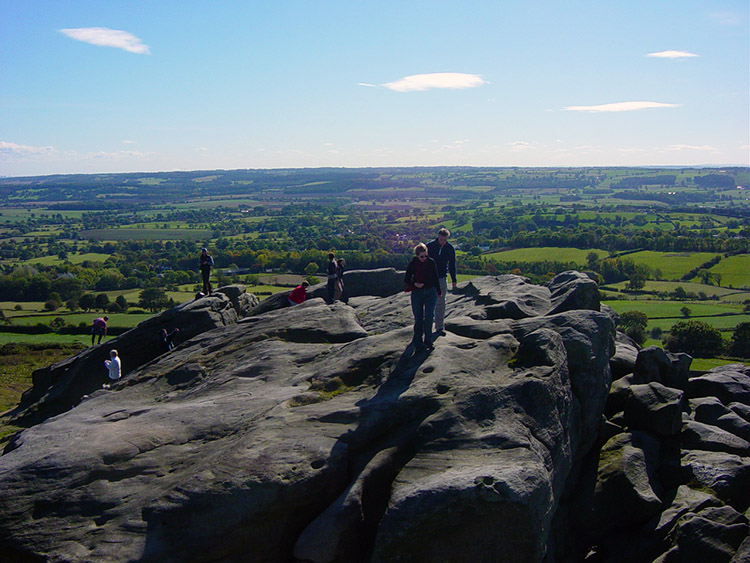 Taking in the view from Almscliff Crag