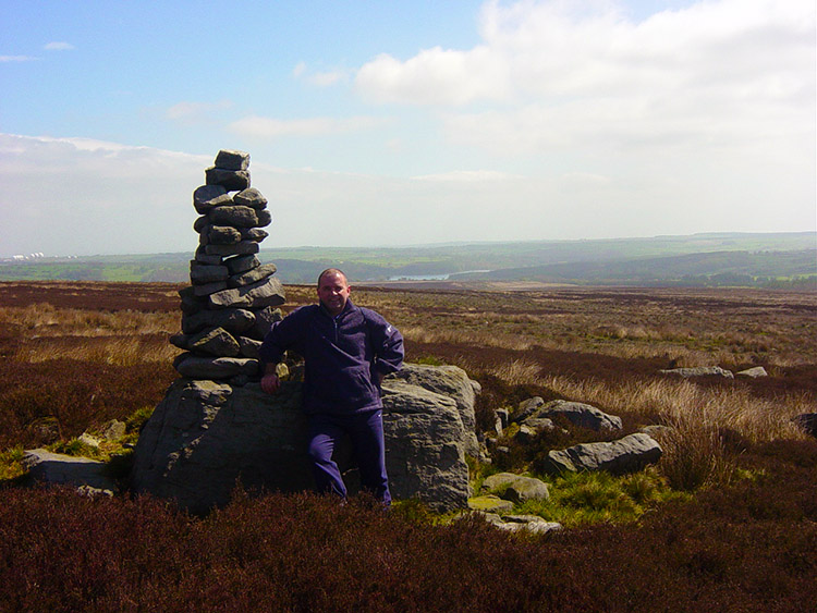 Joe rests by a Cairn on Blubberhouses Moor