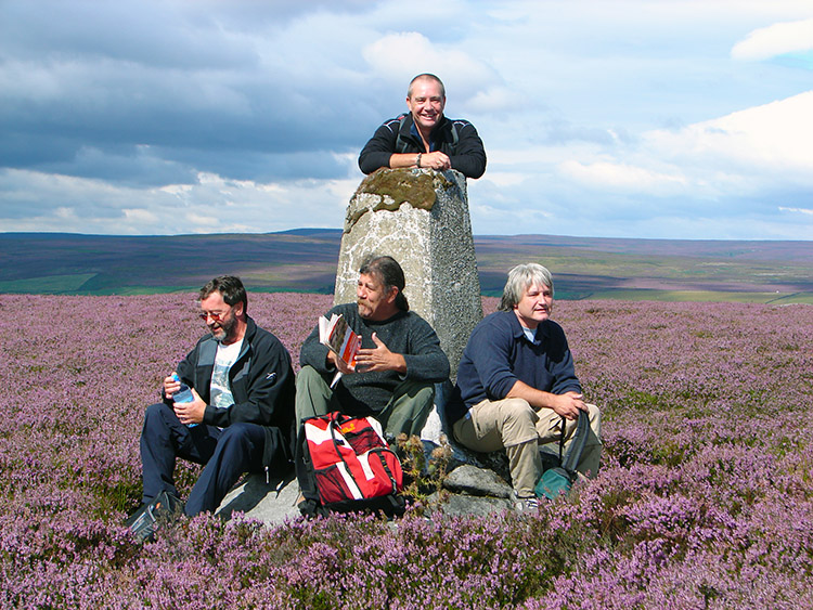 The boys take a break at the trig point