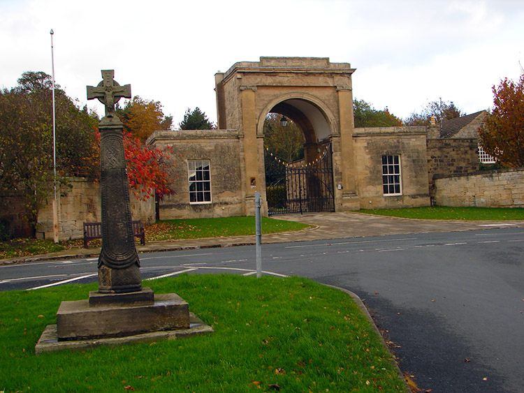 Rudding Gate and village cross in Follifoot