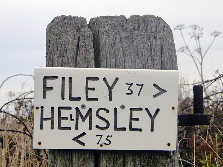 A Cleveland Way milepost sign