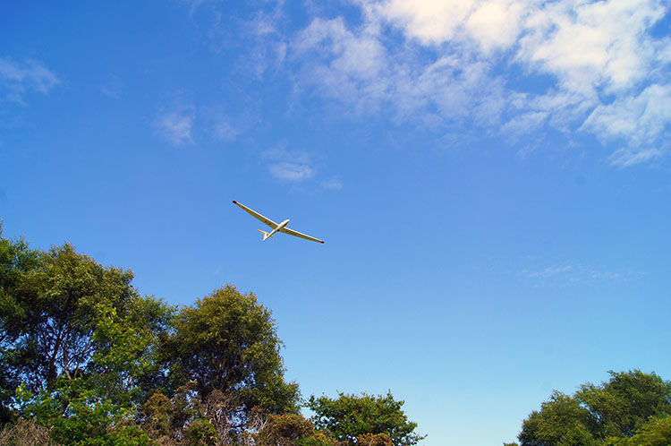 Glider soaring above the White Horse