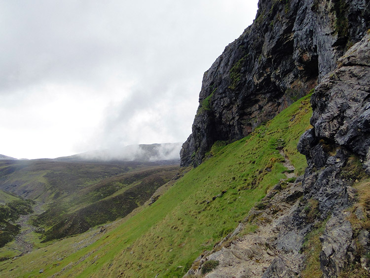 Climbing the narrow path to the Bone Caves