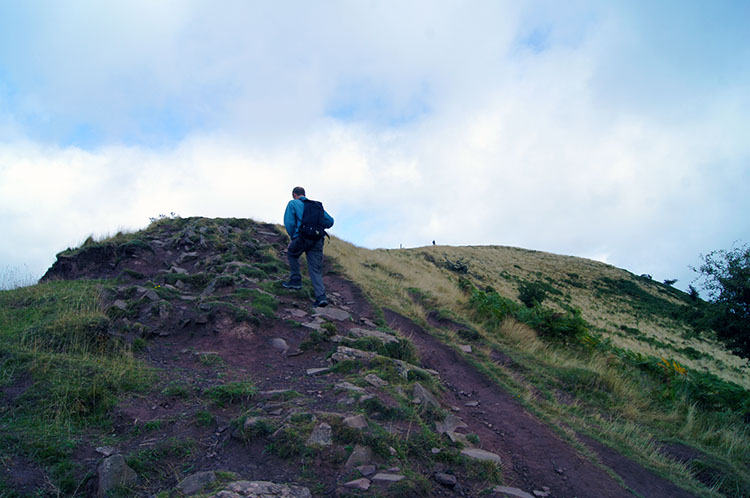 Into the open and climbing to the summit ridge