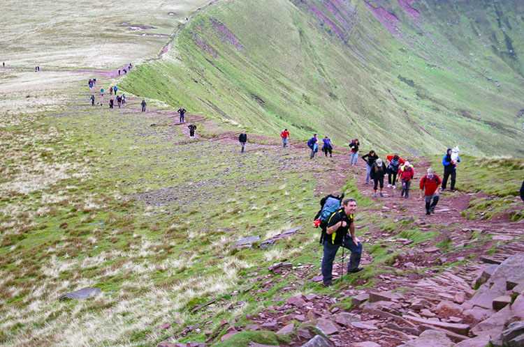 Walkers climbing to Corn Du from the Storey Arms track