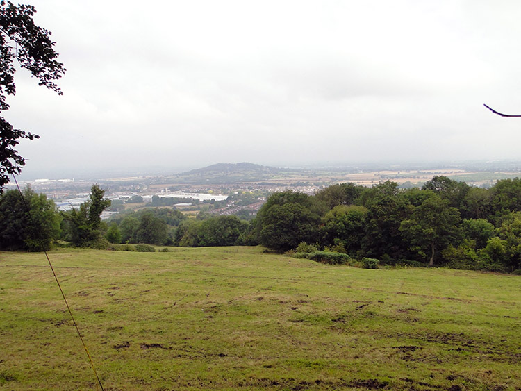 A woodland opening provides views to Churchdown Hill