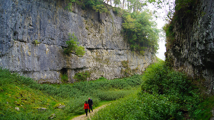 Walkers enjoying the theatre of Trow Gill