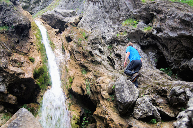 Climbing through Gordale Scar