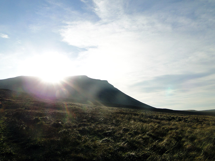 Sun glints over Ingleborough