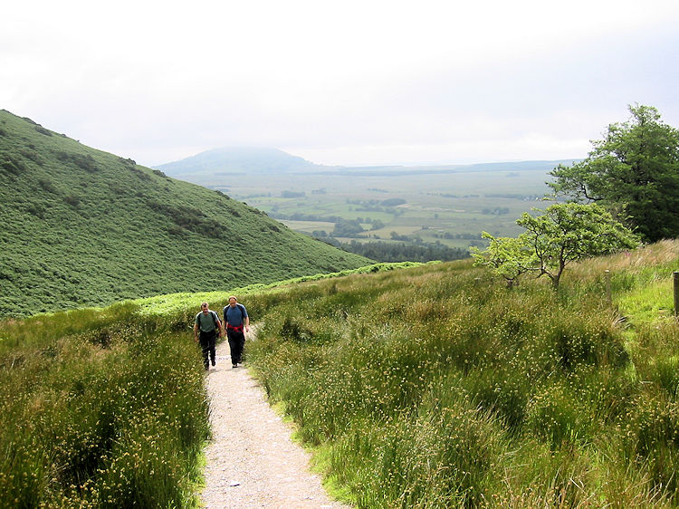 Setting off with Great Mell Fell in the background