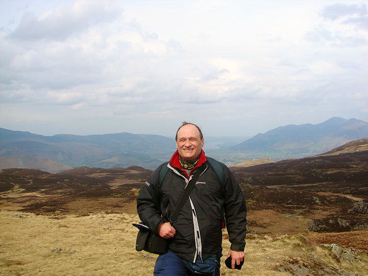 Smiling despite the wet terrain