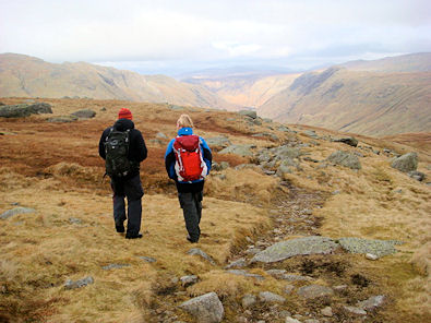 The clouds lift from the tops