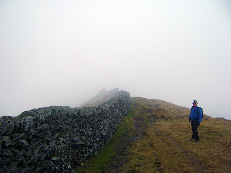 John follows the wall to Low Pike