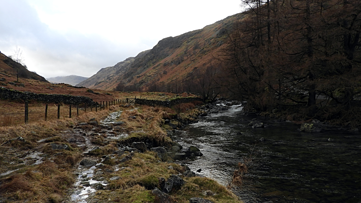 Climbing the sodden path into Langstrathdale