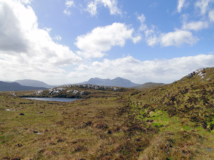 Approaching one of many lochans on the moor