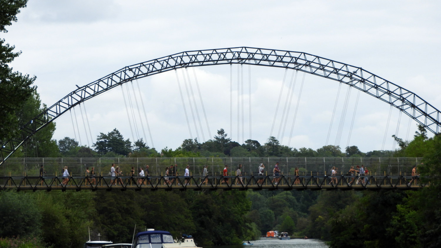Music fans crossing Reading Festival Bridge