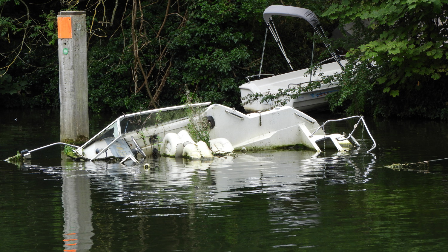 Sunken boat. What a waste