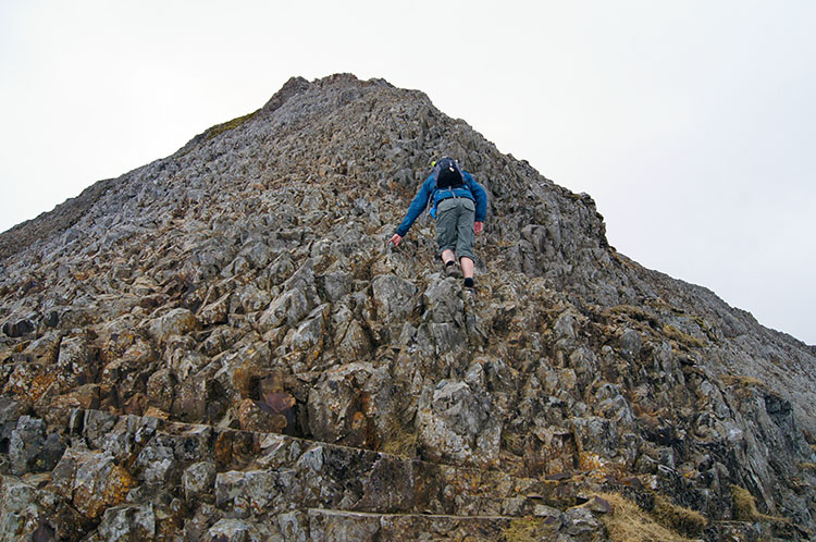 Adam scrambles up to the teeth of the Red Comb