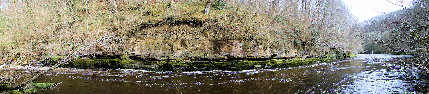 The River Ure bends round a rock face near Hack Fall