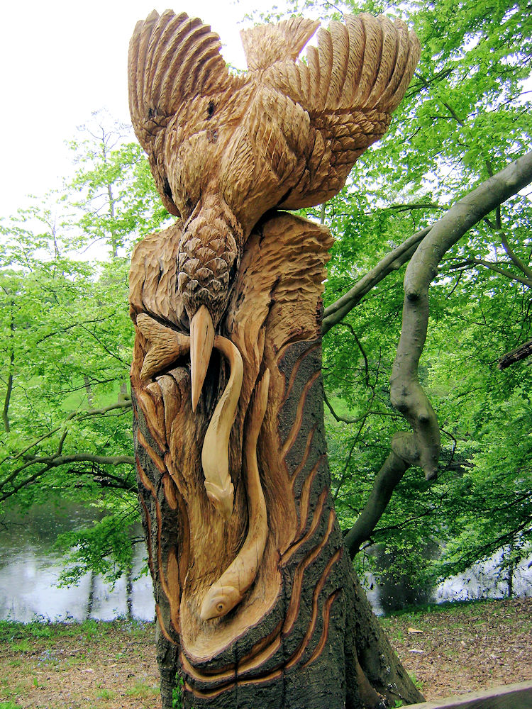Wood sculpture of Kingfisher and Fish