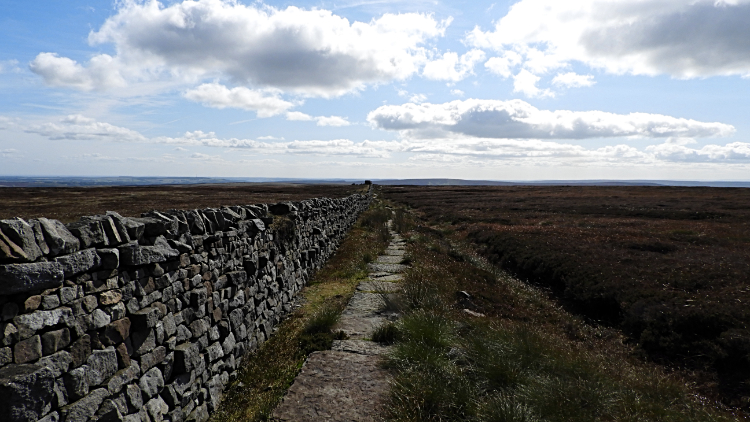 The long wall side path leading south-east