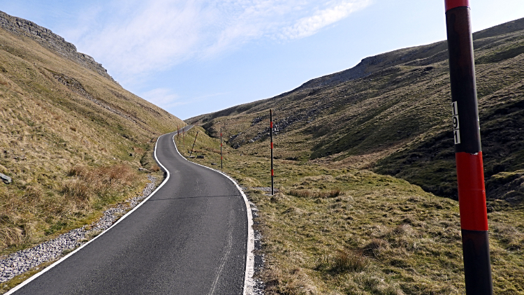 Climbing the road of Great Dun Fell