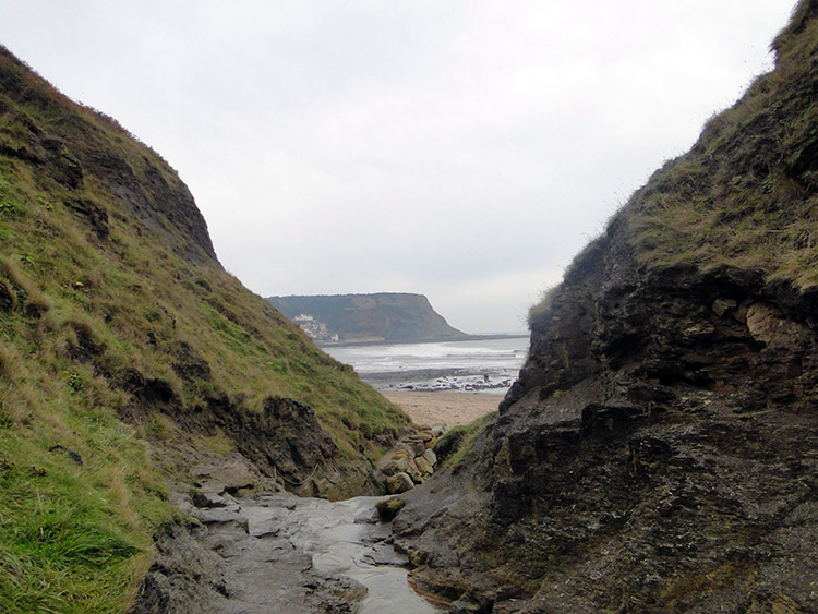The ascent from Runswick Sands is via Hobb Holes