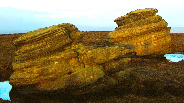 Sunlit Cakes of Bread highlighted on Derwent Edge