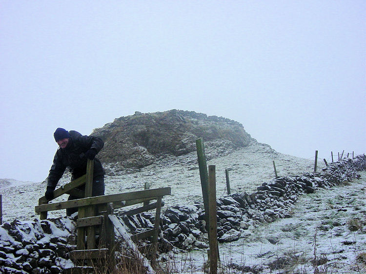 Rickety stile to access Chrome Hill