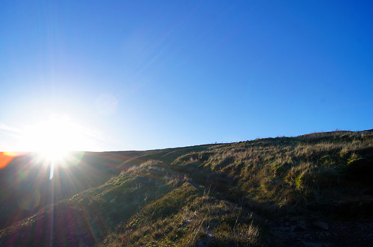 Sun rising over Torside Clough