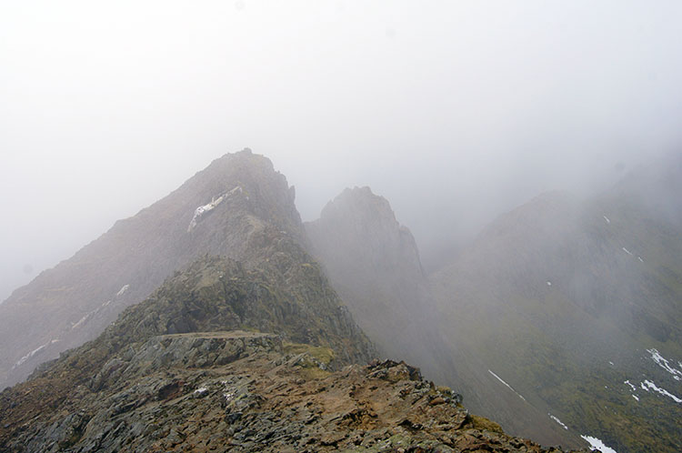 Cloud crosses over Crib Goch as we reach the top ridge