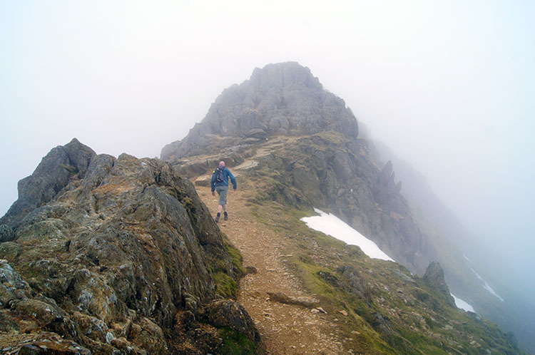 Reaching the summit of Garnedd Ugain at Crib y Ddysgl