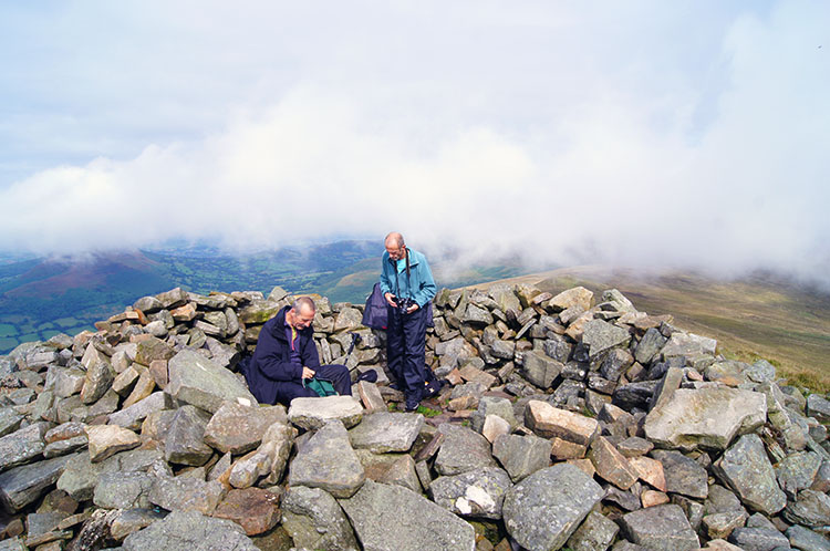 Taking a break in the shelter on Pen Allt-mawr