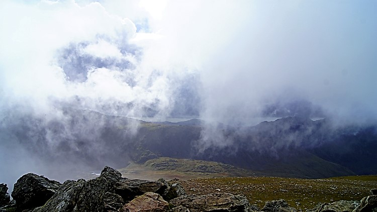 Cloud sweeping over the summit over Y Garn